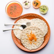 Set Dosa, Oothappam or uttapam style dosa is a popular south Indian food served with sambar and chutney, selective focus